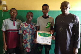 A web design graduand with the director and some students of TheWebmakers' Academy. TheWebmakers Academy is web development training academy based in Ijebu Ode, Ogun State.